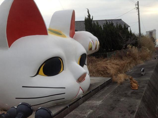 Illustration for article titled Attack on Giant Lucky Cat